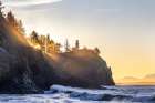 King tide waves crash into cliffs below Lighthouse at Cape Disappointment State Park in Washington Art Print
